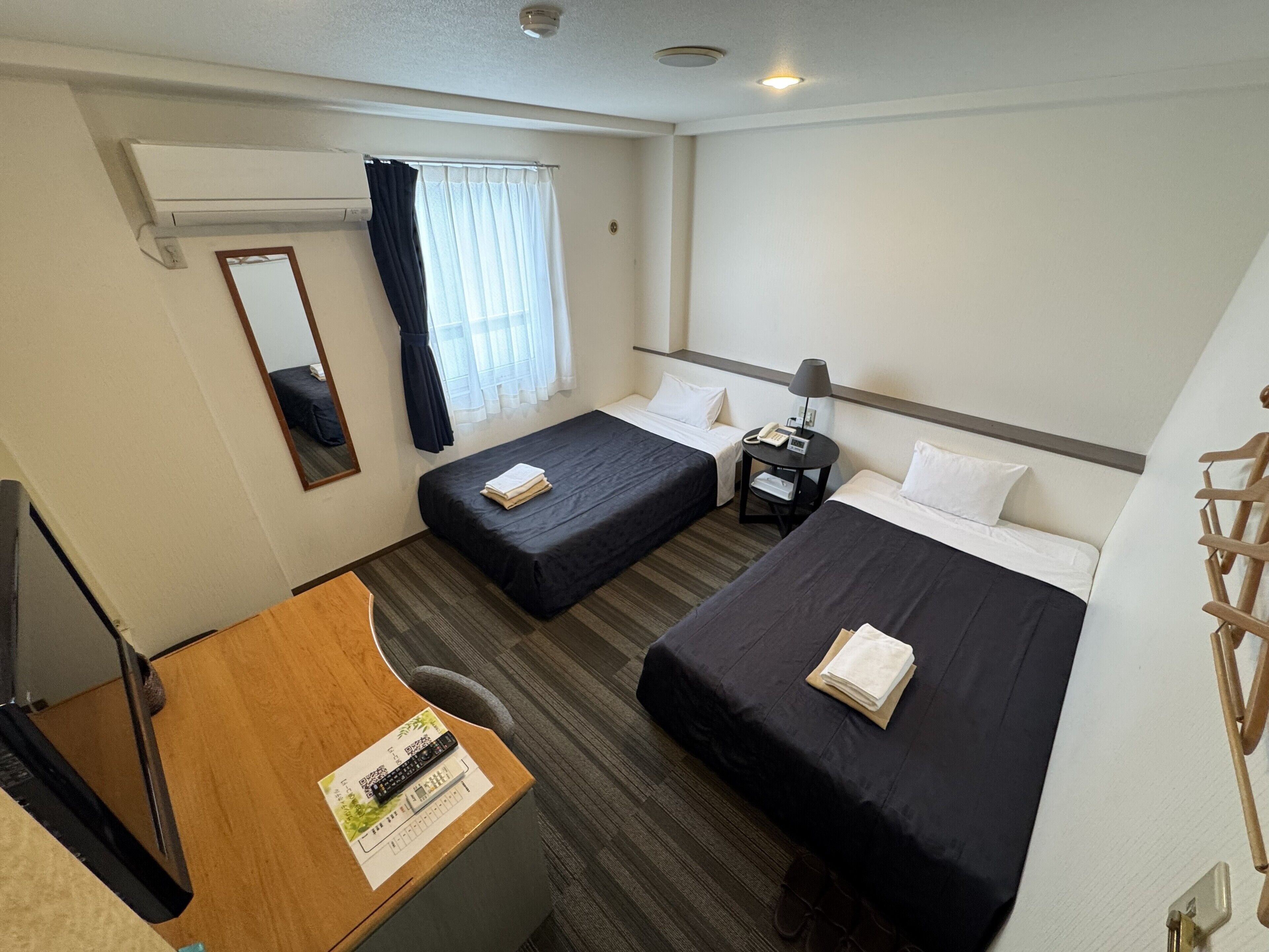 Desk, laptop workspace, free WiFi, bed sheets