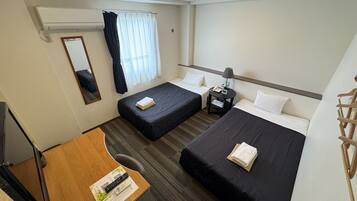 Desk, laptop workspace, free WiFi, bed sheets