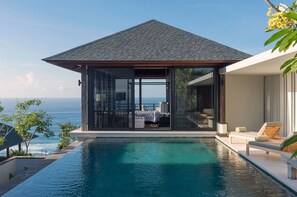 A modern villa with a private pool, a bedroom with a view of the sea, and a balcony with outdoor seating. - Bali Villa 1082: Cliffside Luxury with Ocean Views (Bali)