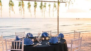 A table set for a meal with a view of the sea. - This Perfect 5 Star Villa in Koh Samui with Beachside Private Pool, Villa Waimarie 1005 (Koh Samui)
