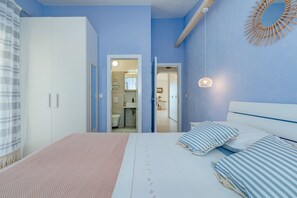 2 slaapkamers, een strijkplank/strijkijzer, gratis wifi, beddengoed