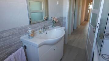 Hair dryer, towels, soap, toilet paper