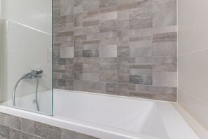 Apartment | Bathroom | Shower, free toiletries, hair dryer, towels - MAMAD - Sunlit Urban Escape with Balcony by Sea N Rent (Tel Aviv)