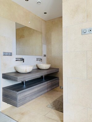 Hair dryer, towels, soap, shampoo