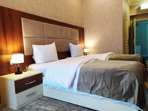 Premium bedding, down comforters, free minibar, in-room safe - The Clocktower Hotel (Baku)