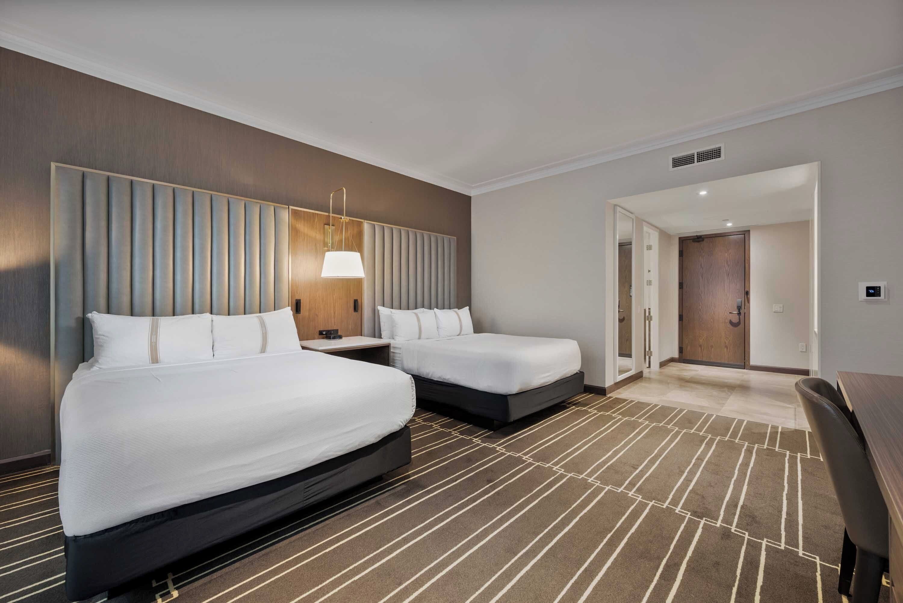 classic room, 2 queen beds | 1 bedroom, premium bedding, in-room safe, individually furnished