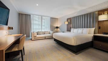 Habitación Deluxe, 1 cama de matrimonio grande | 1 dormitorio, ropa de cama de alta calidad, caja fuerte