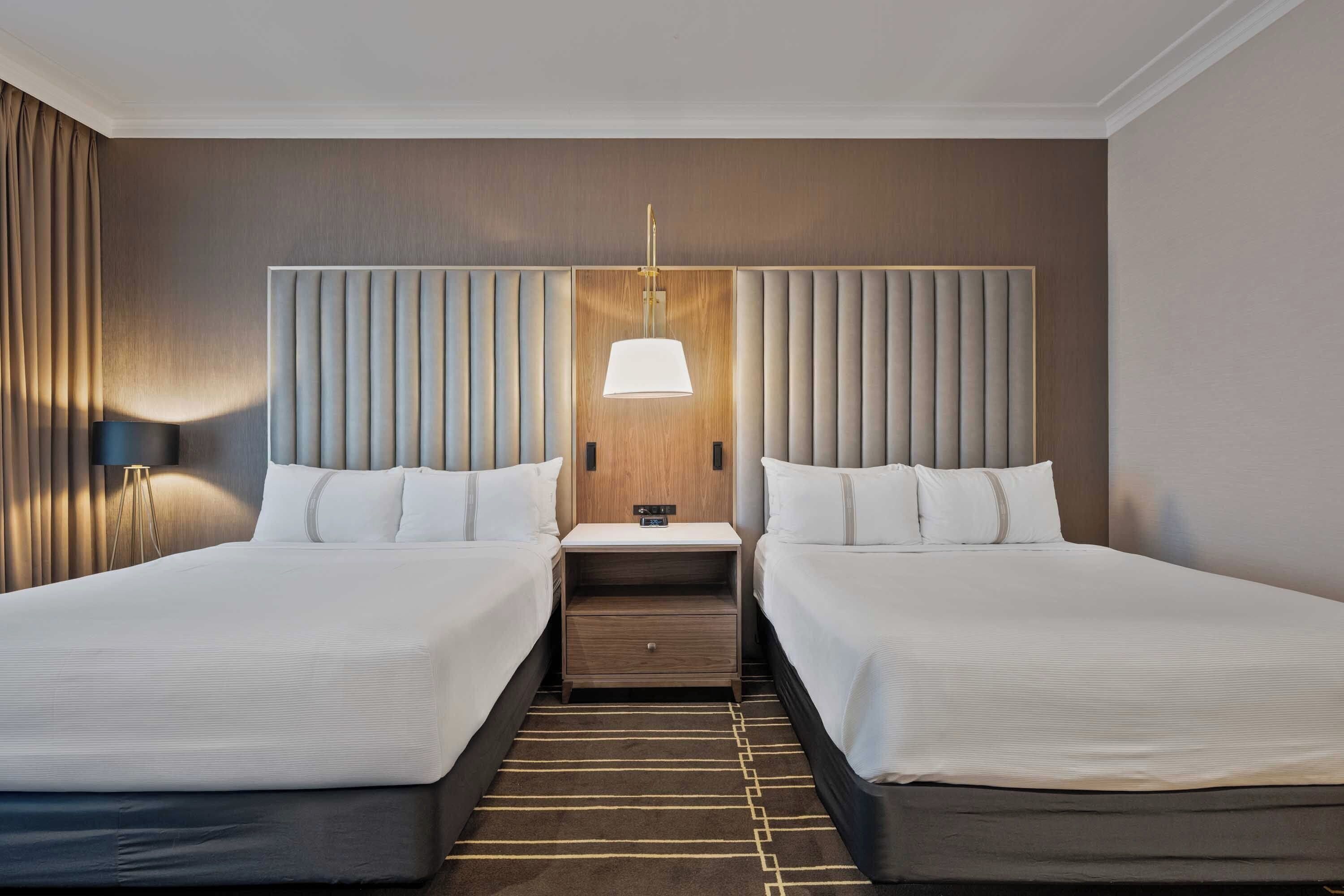 classic room, 2 queen beds | 1 bedroom, premium bedding, in-room safe, individually furnished