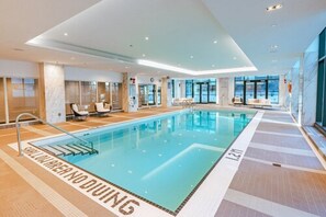 Indoor pool, open 9:00 AM to 10:00 PM, pool loungers