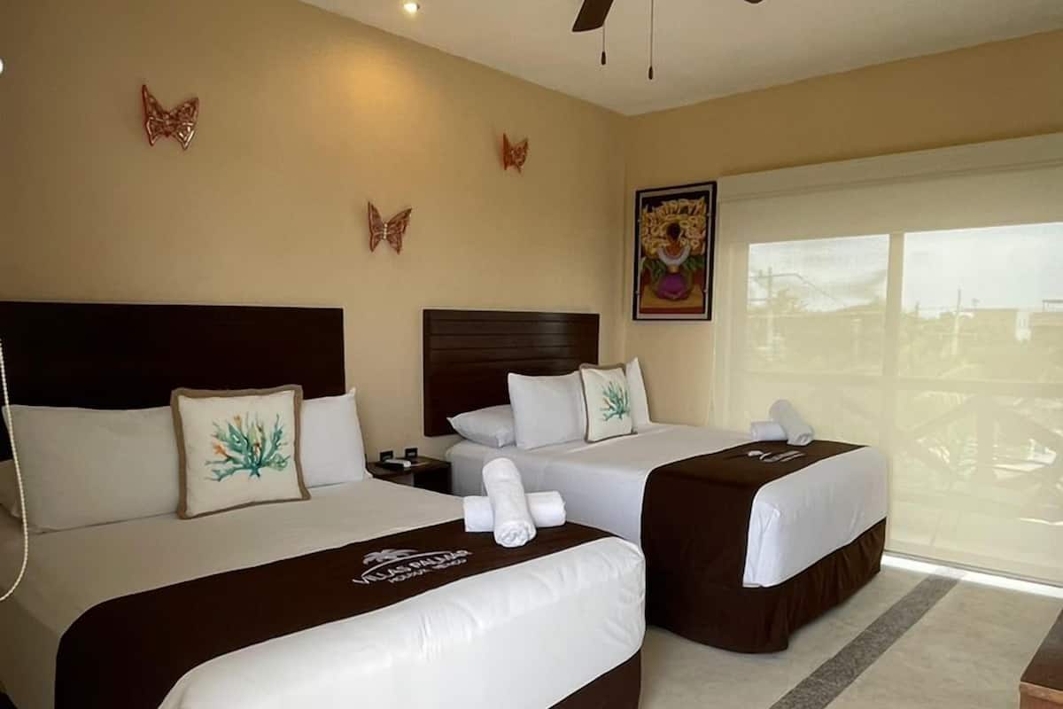 Select Comfort beds, in-room safe, laptop workspace, blackout curtains