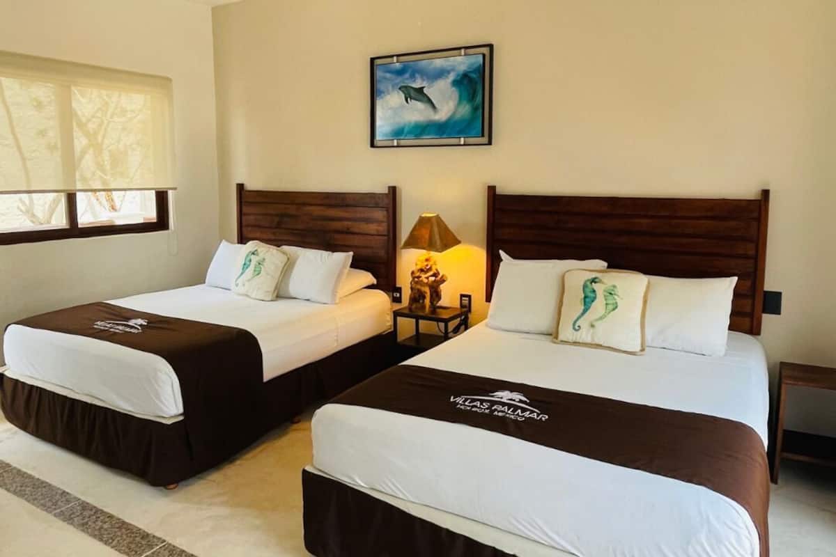 Select Comfort beds, in-room safe, laptop workspace, blackout curtains