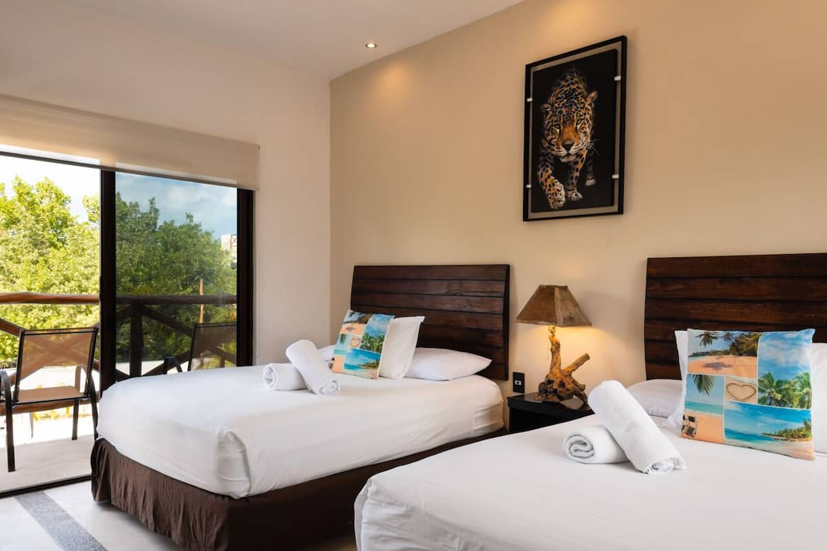Select Comfort beds, in-room safe, laptop workspace, blackout curtains