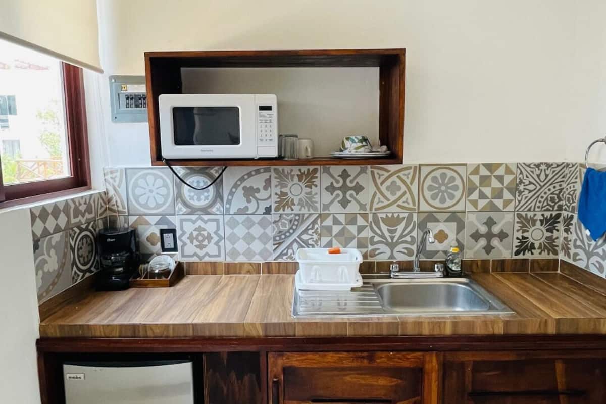 grand double room | private kitchenette | mini-fridge, microwave, coffee/tea maker, cookware/dishes/utensils