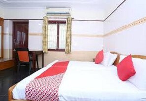 Ropa de cama hipoalergénica y tabla de planchar con plancha