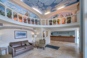 Welcome to Camelot, where a vibrant mural sets the tone for a warm and inviting atmosphere.