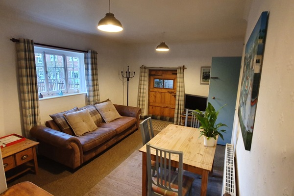 Sitting room. & wooden door to garden