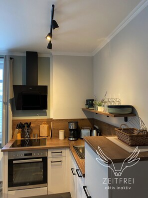 Fridge, oven, stovetop, dishwasher - TIME-FREE HOLIDAY.apartment "Sun Deck" (Steffenshagen)