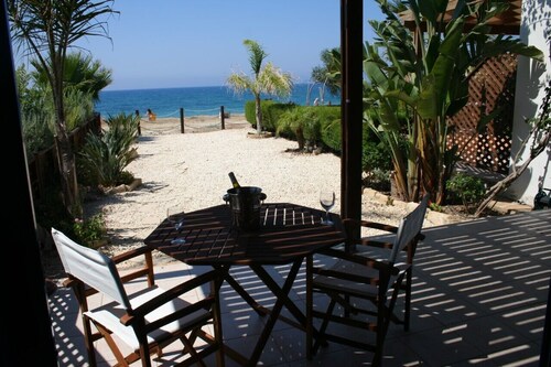 Beach front property, steps away from a beautiful sea