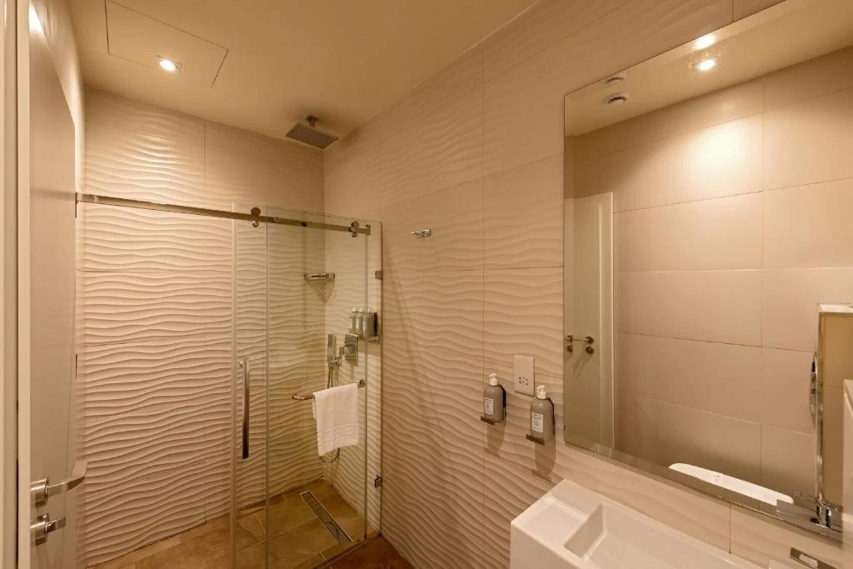 Shower, free toiletries, towels, soap