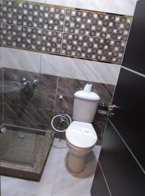 Shower, free toiletries, towels, soap
