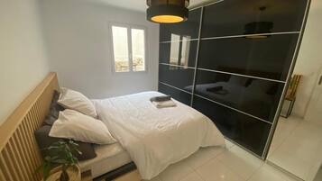 2 bedrooms, desk, iron/ironing board, travel crib