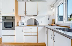 Fridge, oven, stovetop, coffee/tea maker