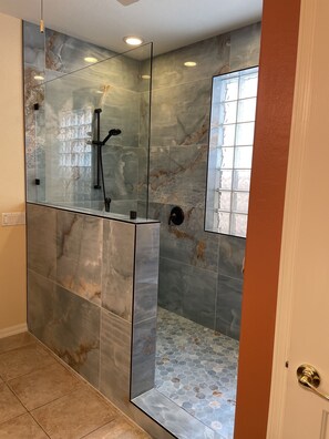 Bathtub, hair dryer, towels, soap