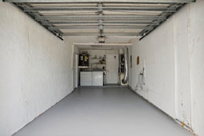 Newly renovated air conditioned garage… Arcade room with tv and gaming console