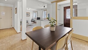 A modern kitchen with a dining area. - Bellavista 4 by Interhome (Parpan)