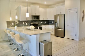 House, Multiple Beds | Private kitchen