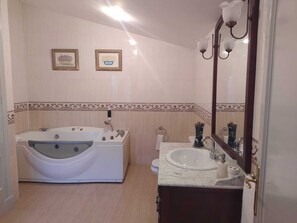 Combined shower/bathtub, jetted bath, hair dryer, bidet