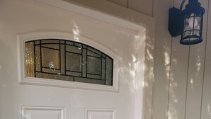 A white door with a glass panel and a keypad lock. - Eastwood Escape Cottage Hot Tub (Oakhurst)