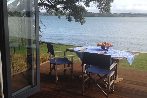 Watch the birds and boats from your deck