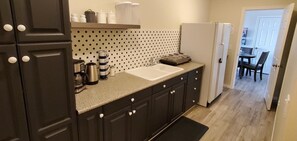 Microwave, blender, cookware/dishes/utensils