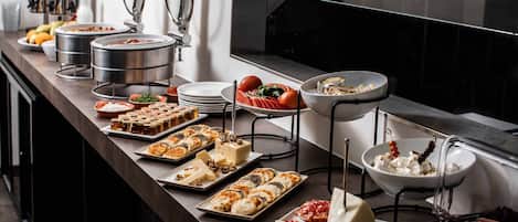 Daily full breakfast (USD 15 per person)