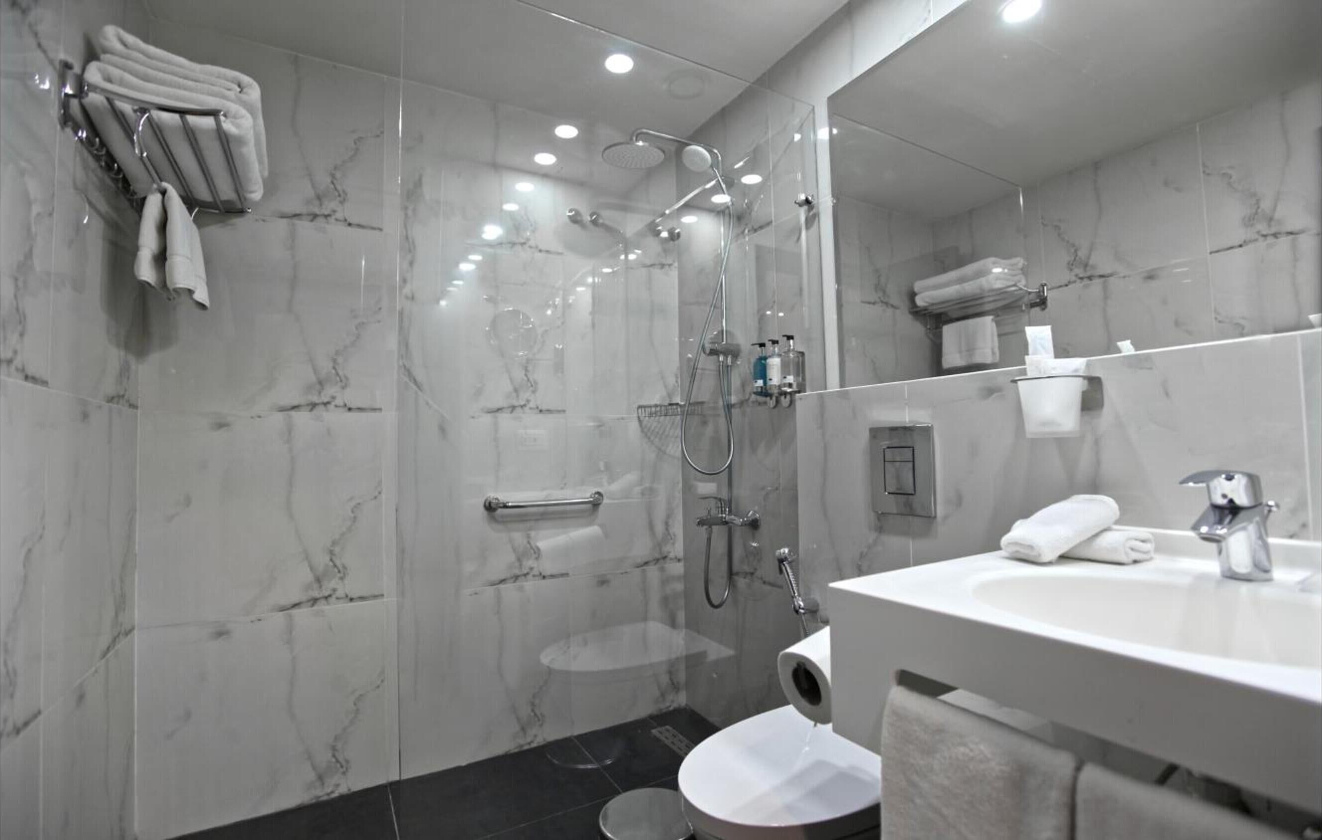 slippers, bidet, towels