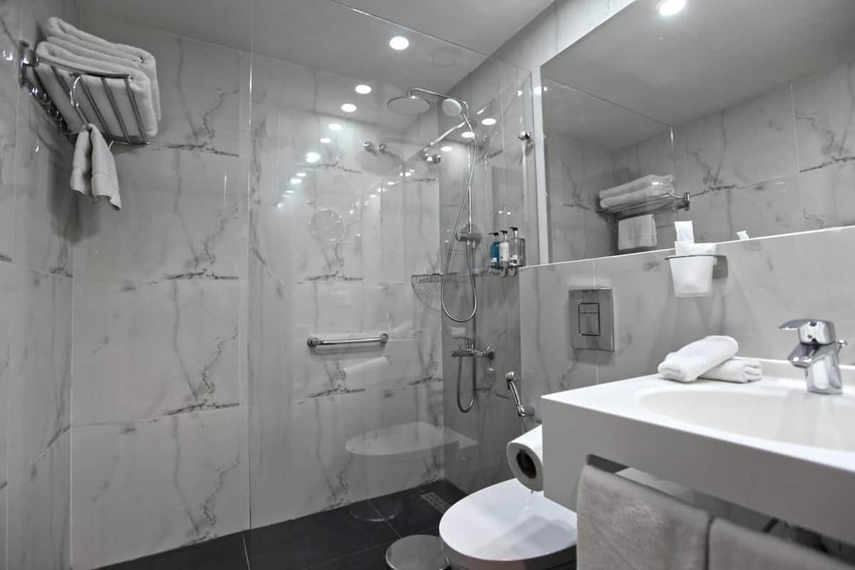 slippers, bidet, towels