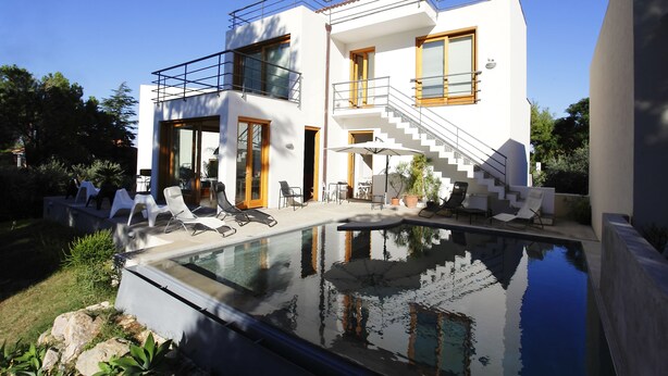 A modern two-story house with a swimming pool, outdoor seating, and a staircase leading to the upper floor. - Sicily 2 - 3 - 4 Person With Pool (Altavilla Milicia)