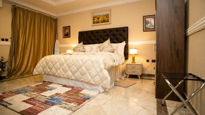 Unclassified image, 2 of 28, button - Brynx Haven -family Room (Cape Coast)