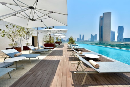 Outdoor pool, open 7:00 AM to 6:00 PM, sun loungers