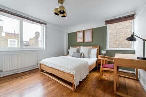 2 habitaciones, tabla de planchar con plancha, wifi y ropa de cama 