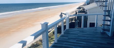 On the beach, sun loungers, beach towels