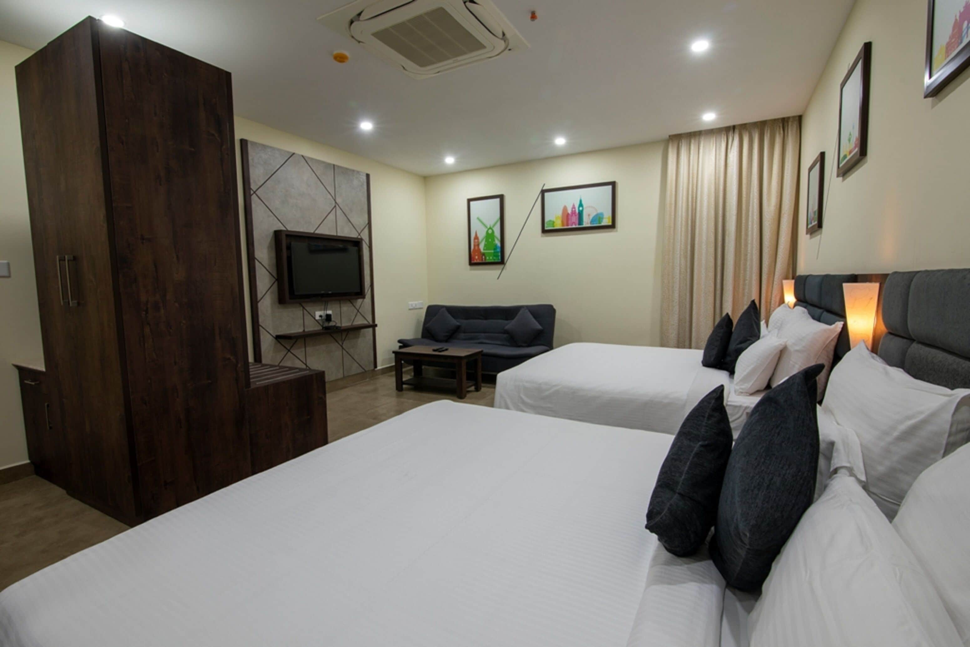 Hypo-allergenic bedding, down comforters, desk, blackout drapes