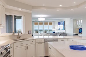 Fridge, microwave, oven, stovetop - 3BR Gulf-Front w/Panoramic Water Views. Steps to Pool & Beach, Resort Amenities (Clearwater)