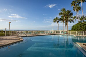 Outdoor pool, a heated pool - 3BR Florida Gulf Coast Family Condo | Ocean Views & Steps from Sand Key Beach (Clearwater)