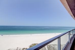 On the beach, sun loungers, beach towels