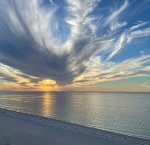 On the beach, sun loungers, beach towels - 3BR Gulf-Front w/Panoramic Water Views. Steps to Pool & Beach, Resort Amenities (Clearwater)