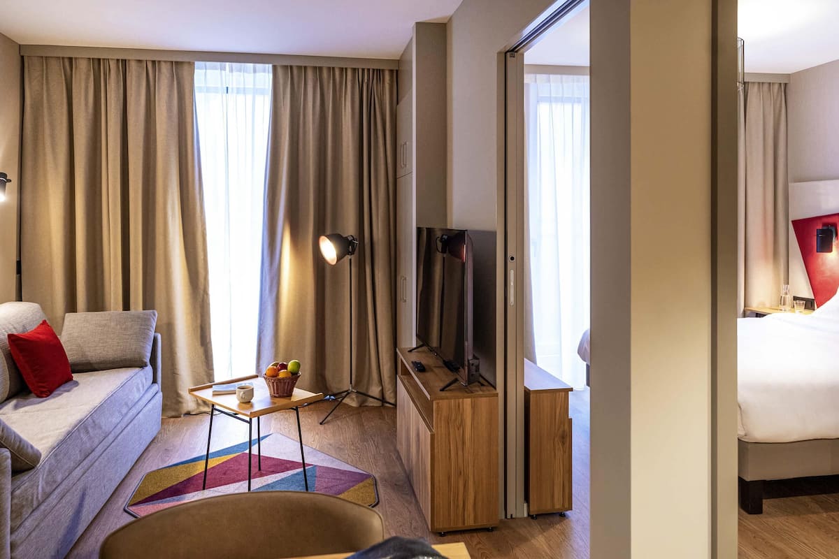 Appartement | Luxe beddengoed, een bureau, geluiddichte muren, gratis babybedden