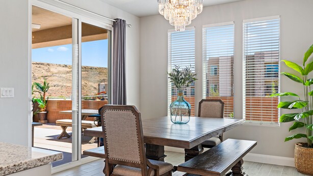 A dining area with a large table, chairs, and a chandelier. - Casa at Ladera Resort, Private Home! (Washington)