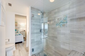 Combined shower/tub, hair dryer, towels, toilet paper